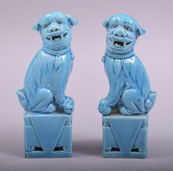 A SMALL PAIR OF CHINESE BLUE GLAZED PORCELAIN KYLIN