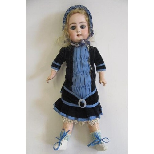 A Simon & Halbig bisque socket head doll, with blue glass sl...