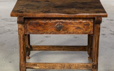 A Spanish Baroque style mixed wood low table