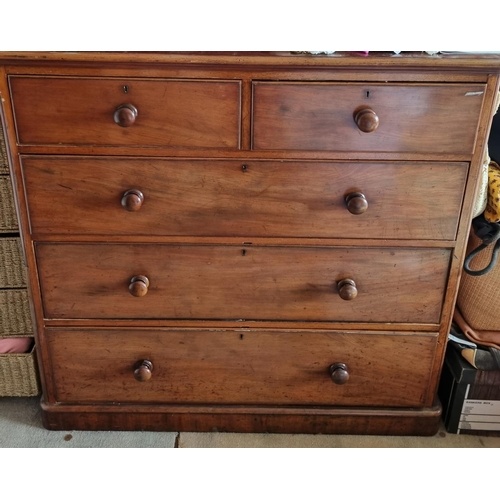 A Victorian Mahogany Chest of Drawers with three graduated l...