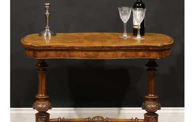 A Victorian walnut serpentine card table, hinged quarter-ven...