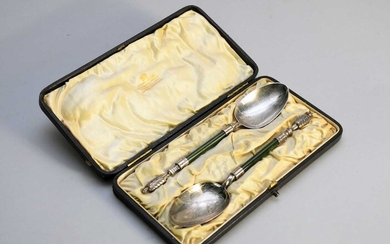 A cased pair of silver spoons with jade handles
