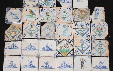 A collection of 18th and 19th century Delft tiles, including...