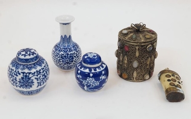 A collection of Chinese objects, 19th-20th century, comprising of two small blue and white jars and covers, a miniature blue and white bottle vase with four-character jing de zhen zhi mark, an inlaid bone carved snuff bottle, and a hardstone inlaid...