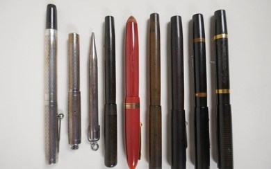A collection of Mabie Todd fountain pens including a...