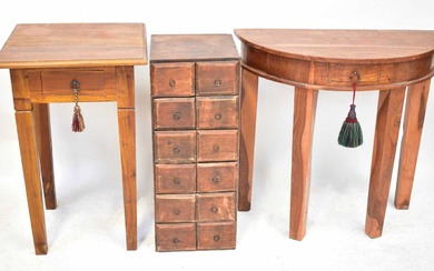 A collection of teak and hardwood furniture comprising a demi-lune...