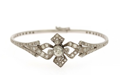 A diamond bangle set with numerous old- and single-cut diamonds, mounted in 14k white gold. Diam 5,2 cm.