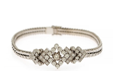 A diamond bracelet set with numerous brilliant-cut diamonda, mounted in 18k white gold. L. 18 cm.