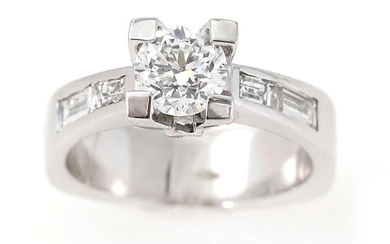 A diamond ring set with a brilliant-cut diamond weighing app. 0.90 ct....