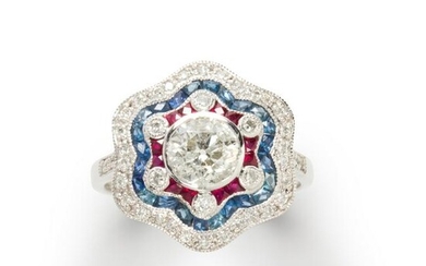 A diamond, ruby, sapphire and platinum ring