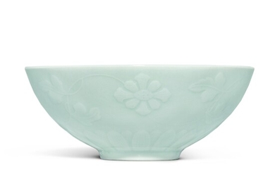 A fine molded celadon-glazed 'floral' bowl, Mark and period of Yongzheng | 清雍正 粉青釉浮雕纏枝花卉紋盌 《大清雍正年製》款