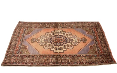 A full pile fine hand woven Iranian rug, with a traditional...