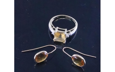 A gold ring and a pair of 9ct gold gem set earrings total we...