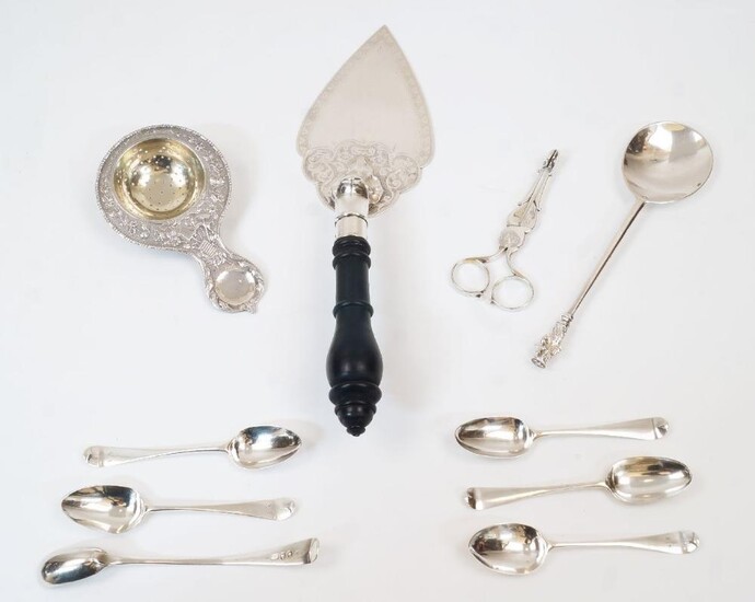 A group of silver and oddments comprising: a silver tea strainer with Chester import marks; a pair of silver sugar nips, marks rubbed; a silver spoon with figural terminal; four Georgian silver teaspoons, three with rubbed picture backs; a silver...