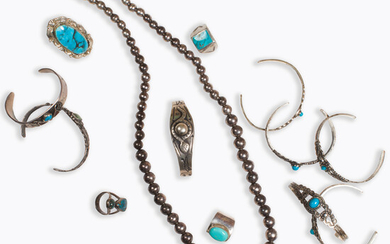 A group of turquoise and silver jewelry, inclu Native American