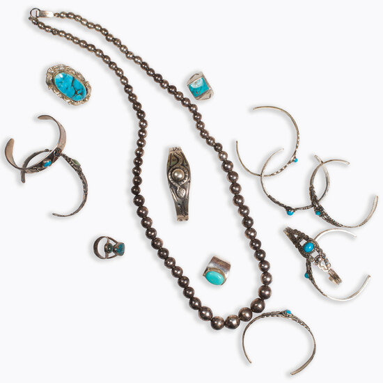 A group of turquoise and silver jewelry, inclu Native American