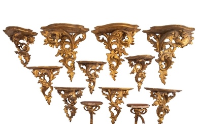 A group of twelve Italian carved and giltwood wall brackets,...