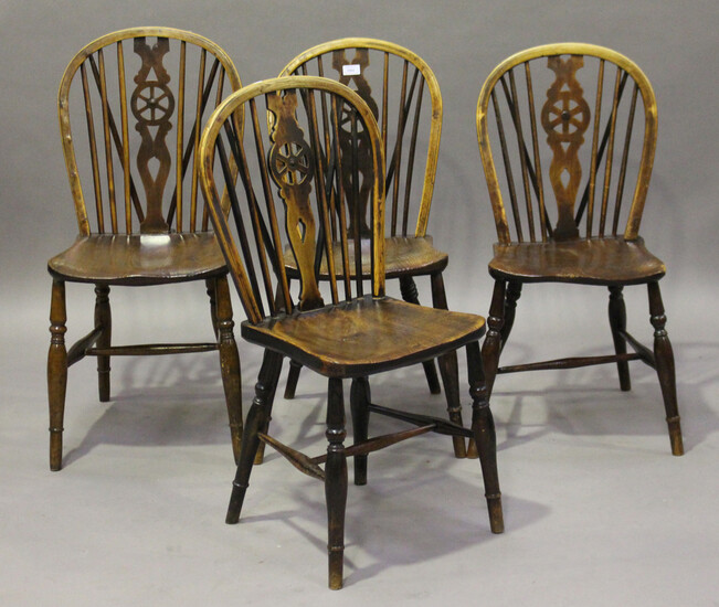 A harlequin set of four early Victorian ash and elm stick and wheel back Windsor dining chairs, heig