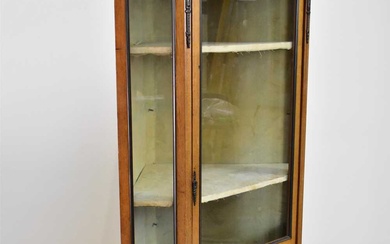 A late 19th century French vitrine with brass galleried top...