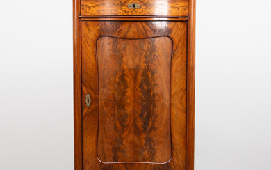 A late 19th century mahogany neo-rococo column cabinet.