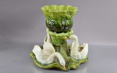 A late 19th or early 20th Century Bretby majolica pottery jardiniere and stand centrepiece