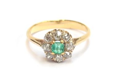 A late 19th/early 20th century emerald and diamond cluster r...