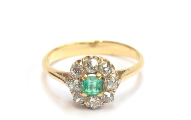 A late 19th/early 20th century emerald and diamond cluster r...