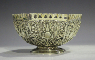 A late Victorian silver hexagonal rose bowl, decorated in relief with floral and scroll decoration b