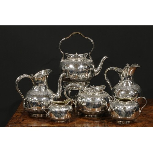 A late Victorian/Edwardian silver six piece Cape pattern tea...