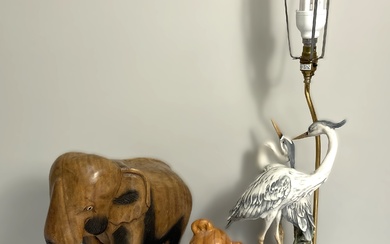 A modern table lamp base, with figures of Heron; together with a carved wood elephant and a teddy