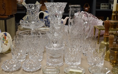 A nice selection of cut glass pieces including whiskey glasses, decanter, large vases and tazza etc.
