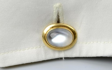 A pair of Edwardian 18ct gold moonstone cufflinks.