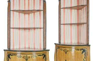 A pair of Italian Rococo corner cupboards