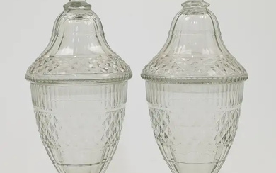 A pair of Regency style hobnail cut sweetmeat glass jars and covers,...