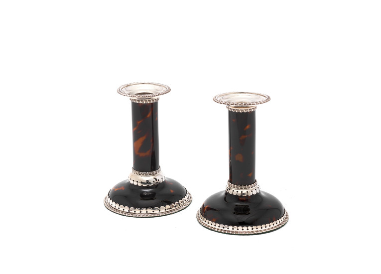 A pair of Victorian silver and tortoiseshell candlesticks