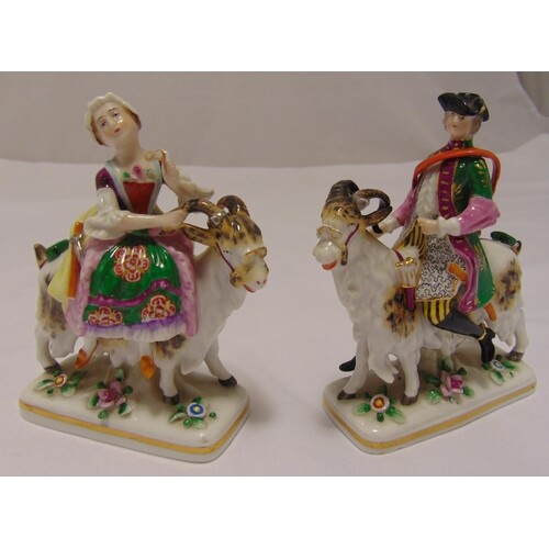 A pair of late 19th century continental figurines of a lady ...