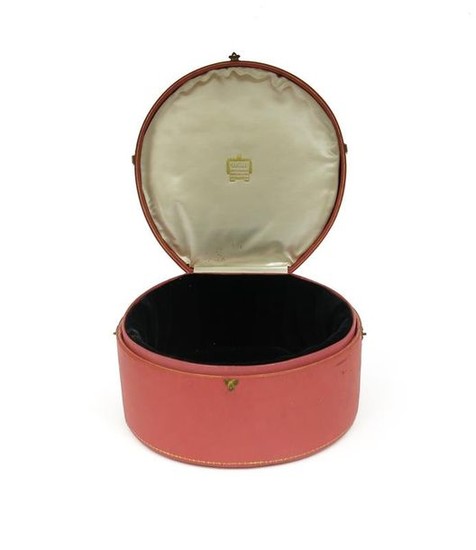 A pink leather tiara case by Cartier, with...