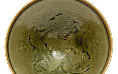 A rare early carved Yaozhou celadon bowl