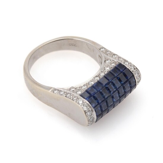 NOT SOLD. A sapphire and diamond ring set with numerous sapphires weighing a total of app. 6.38 ct. and numerous diamonds, mounted in 18k white gold. Size 53. – Bruun Rasmussen Auctioneers of Fine Art