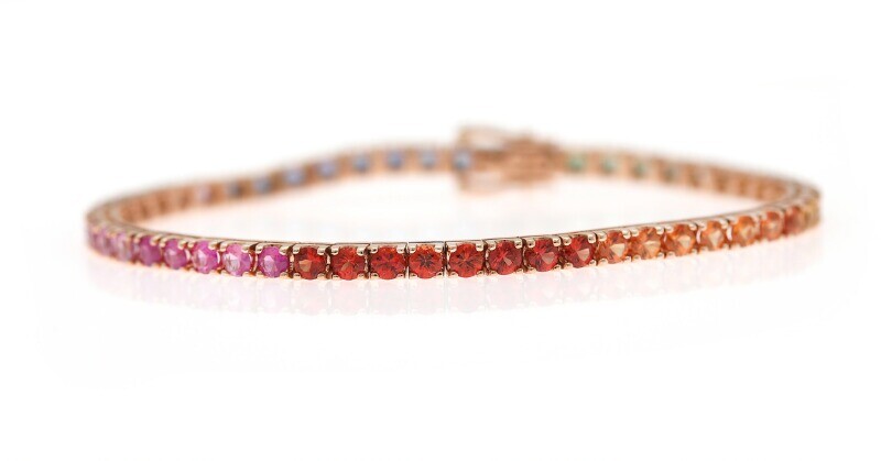 NOT SOLD. A sapphire bracelet set with numerous circular-cut sapphires, mounted in 18k rose gold....