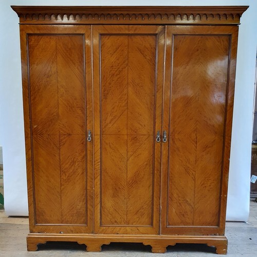 A satinwood triple wardrobe, retail label for S & H Jewell, ...