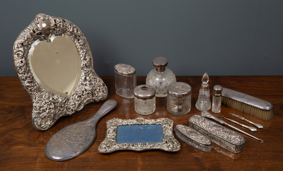 A silver and silver plated dressing table set
