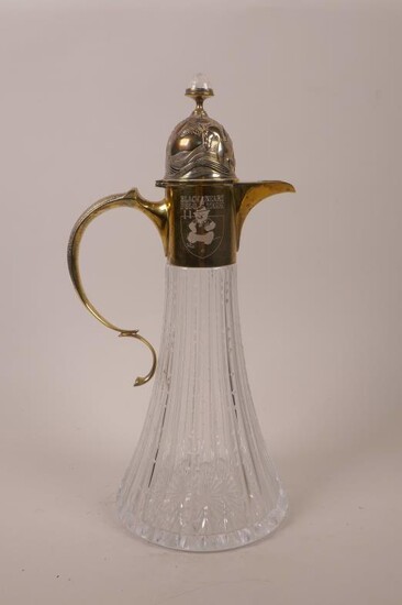 A silver gilt mounted Royal Brierly cut glass decanter,...