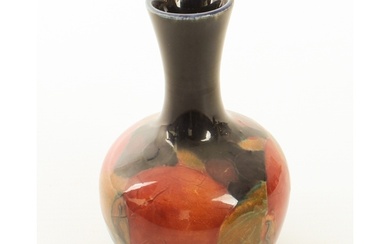 A small William Moorcroft 'Pomegranate' pattern vase - of bo...