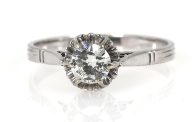 A solitaire diamond ring set with a brilliant-cut diamond weighing app. 0.60...