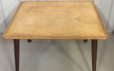 A vintage side table. Dimensions(cm) H33, W54, D54.