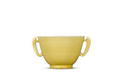 A yellow-glazed handled cup, Mark and period of Kangxi | 清康熙 黃釉暗刻龍紋耳盃 《大清康熙年製》款