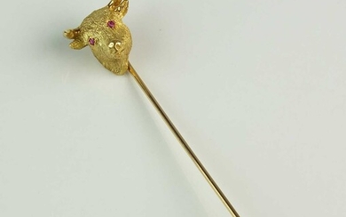 A yellow metal Bull's head stick pin