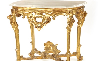 AN 18TH CENTURY CARVED GILTWOOD CONSOLE TABLE with white...