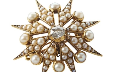 AN ANTIQUE DIAMOND AND SEED PEARL STARBURST BROOCH